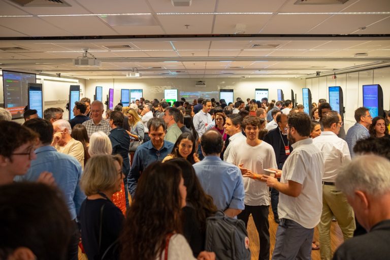 Students presenting projects to professors, mentors and guests